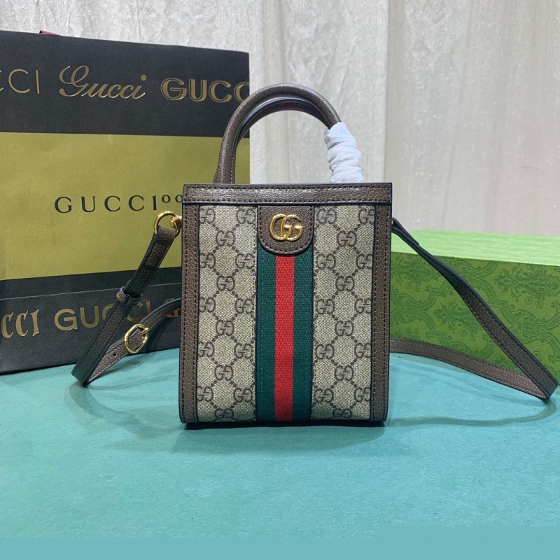 G*u*i shopping bags
